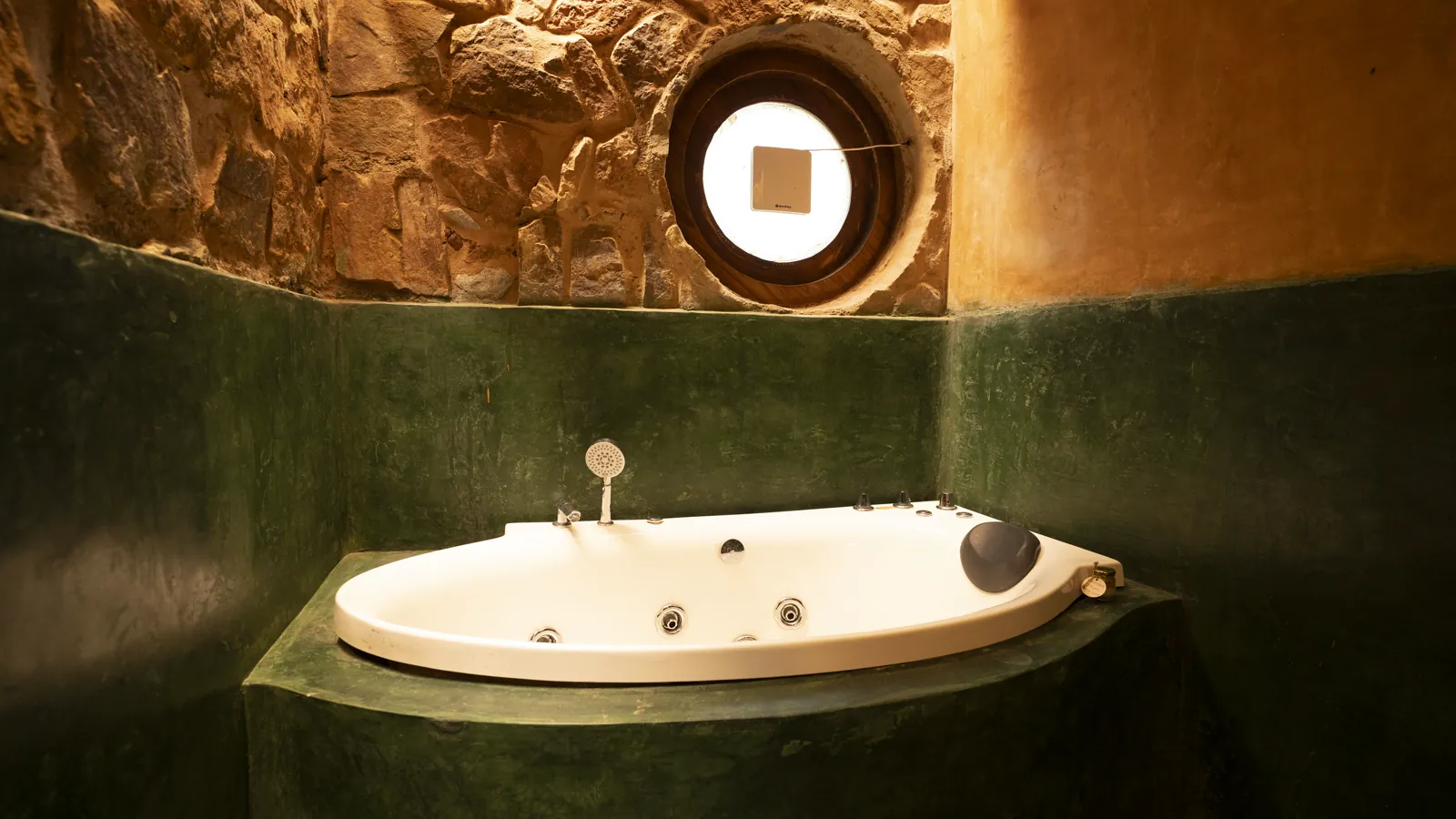 The Burrow — the indoor jacuzzi in green oxide