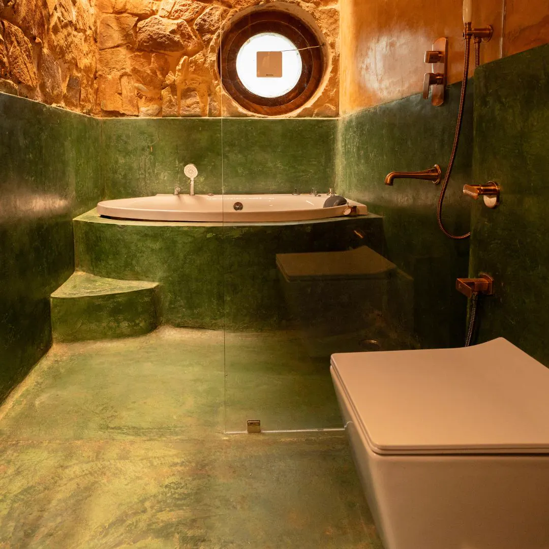 The Burrow — the indoor jacuzzi in green oxide