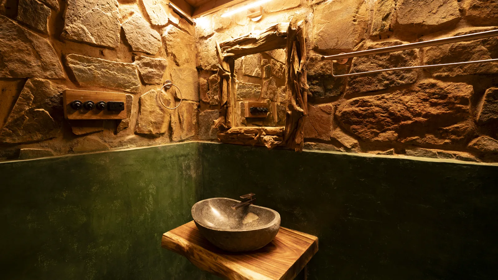 The Burrow — the bathroom and its stone basin