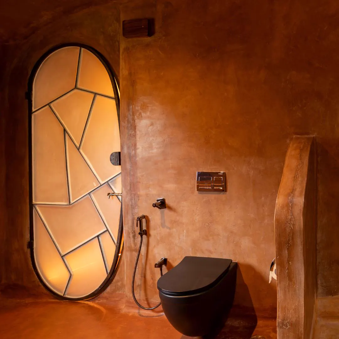 The Colony — the round door from the bath