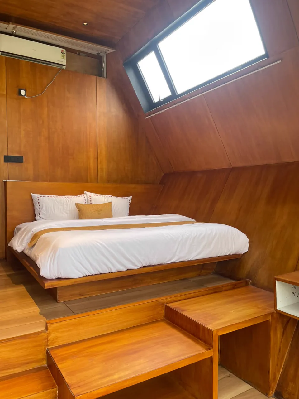 The Hive — the bedroom beneath its skylight