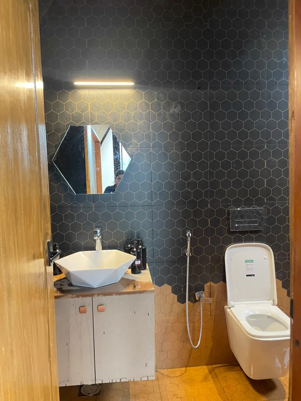 The Hive — the bathroom and its tiled vanity