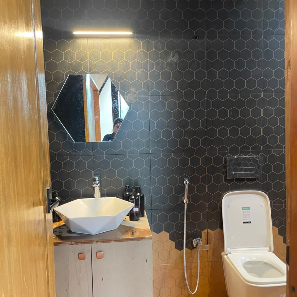 The Hive — the bathroom and its tiled vanity