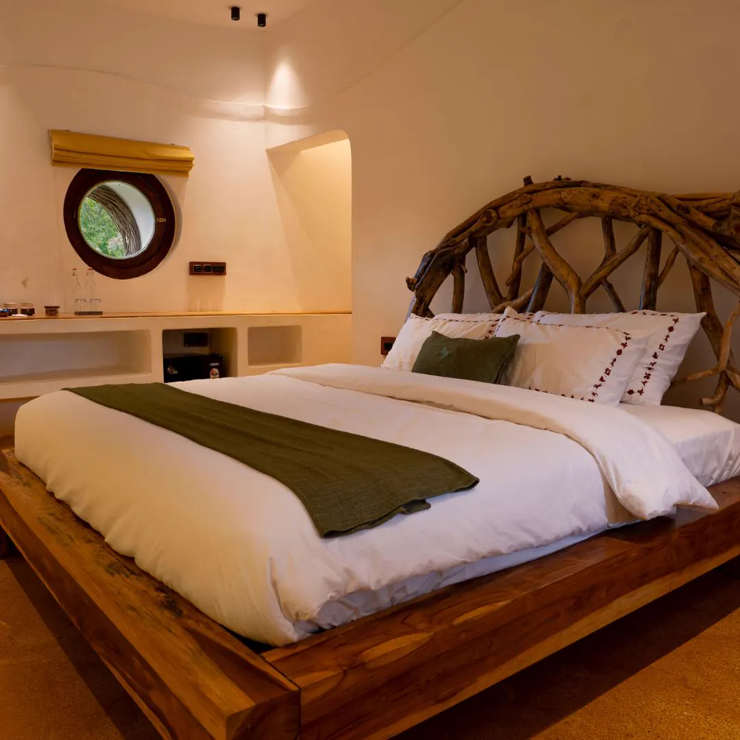 The Nest — the bedroom and its branch headboard