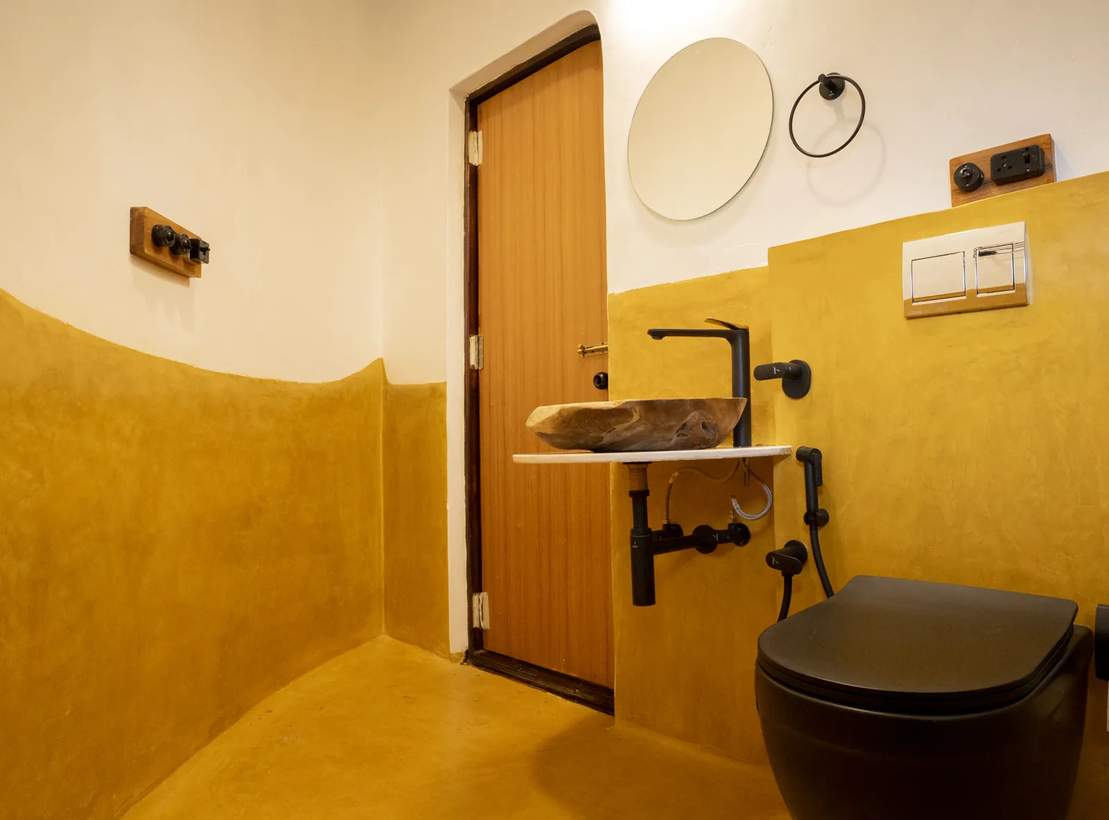 The Nest — the bathroom and its carved basin