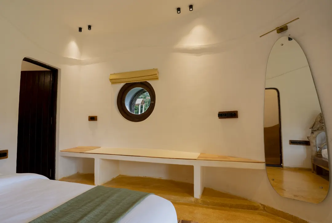 The Nest — the bedroom's porthole window