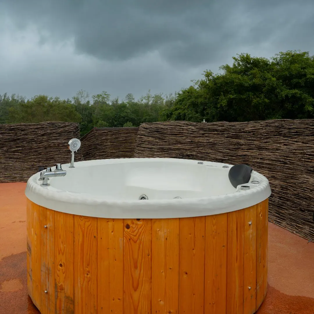 The Nest — the rooftop jacuzzi, open to the sky
