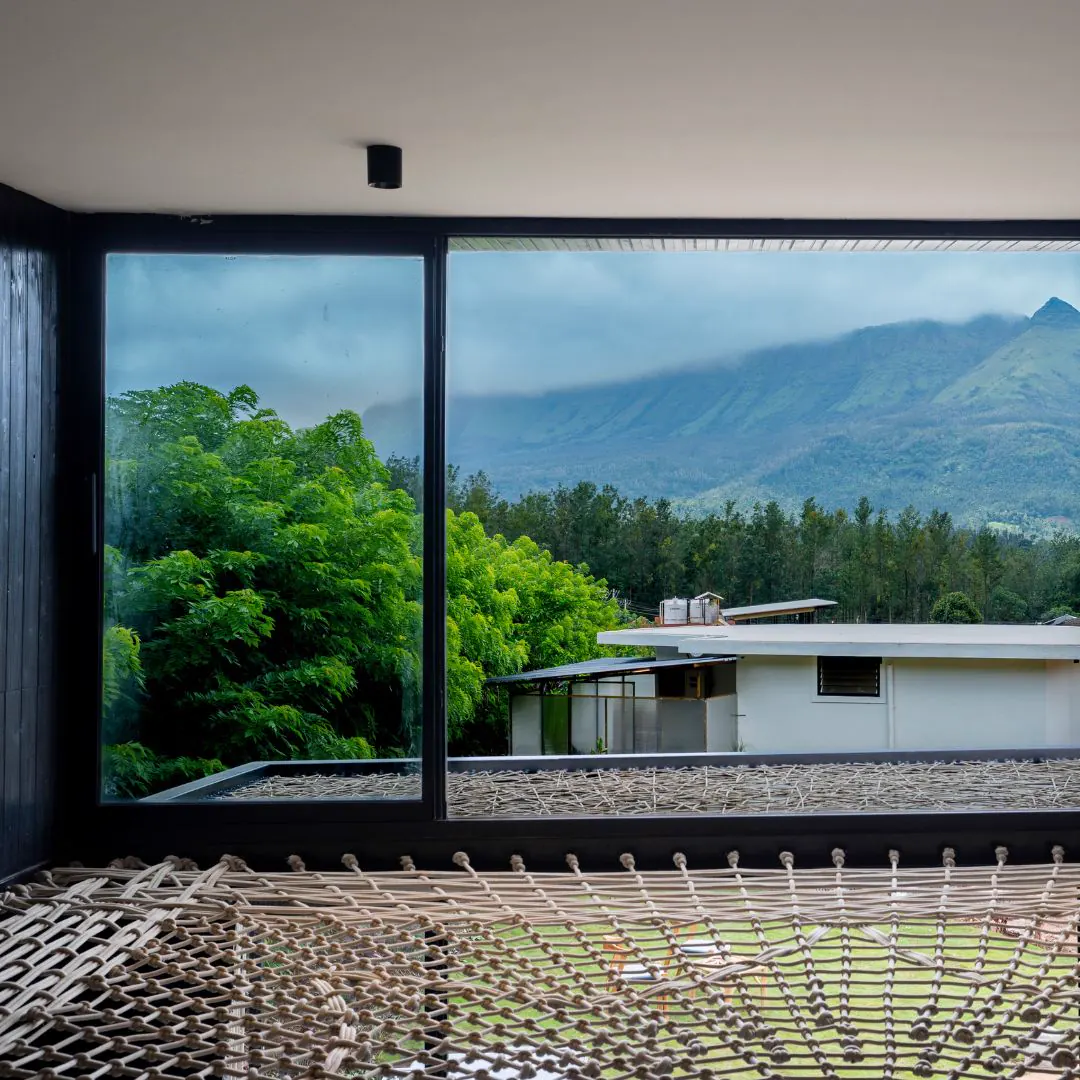 The Weave — the hammock floor and the mountains beyond