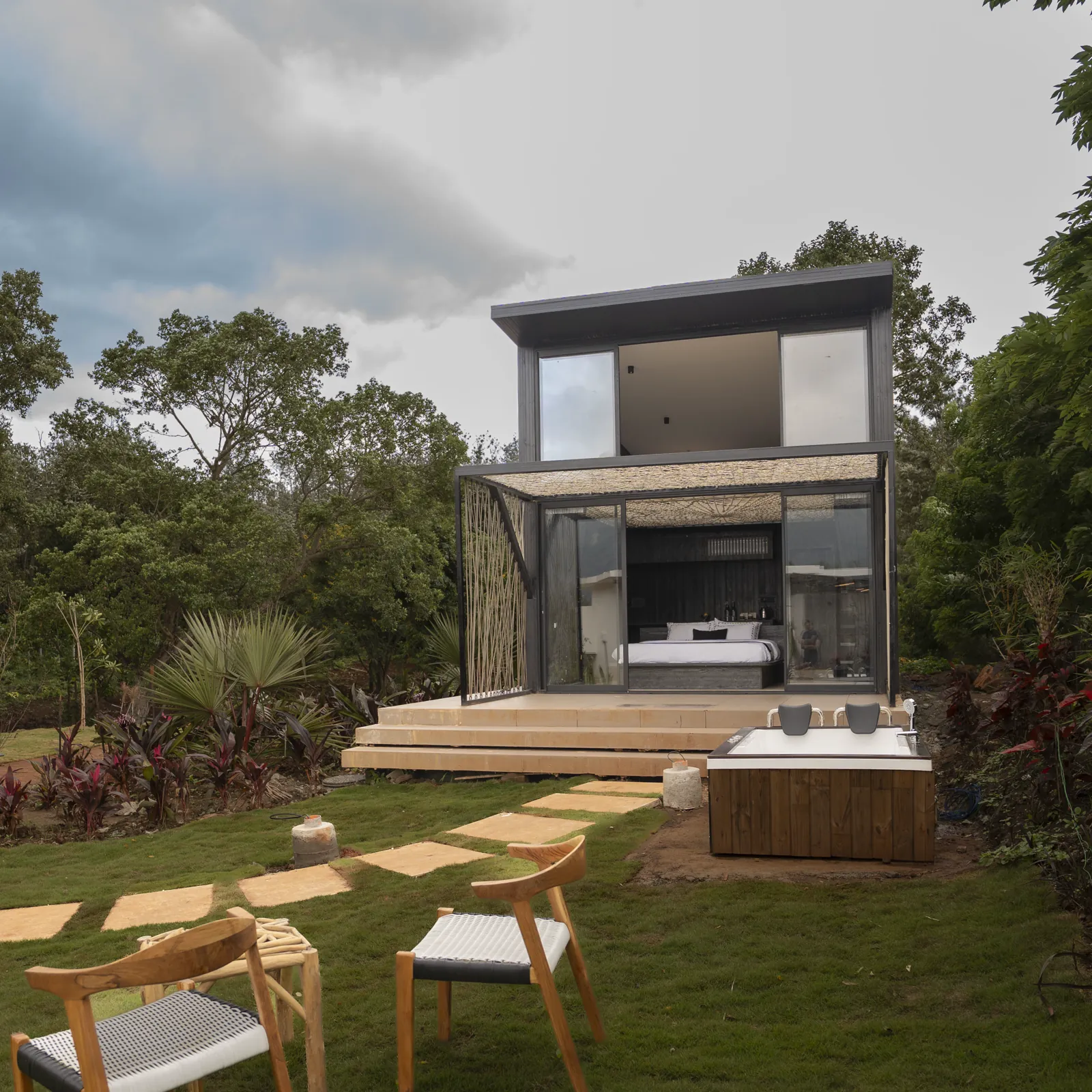 The Weave — exterior, the black box on the lawn